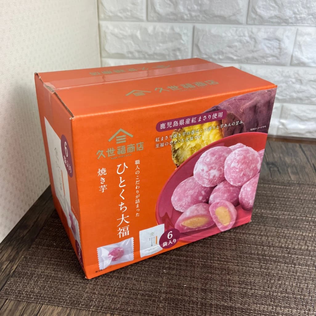 コストコで購入した久世福商店「ひとくち大福 焼き芋」のオレンジ色の外箱パッケージ